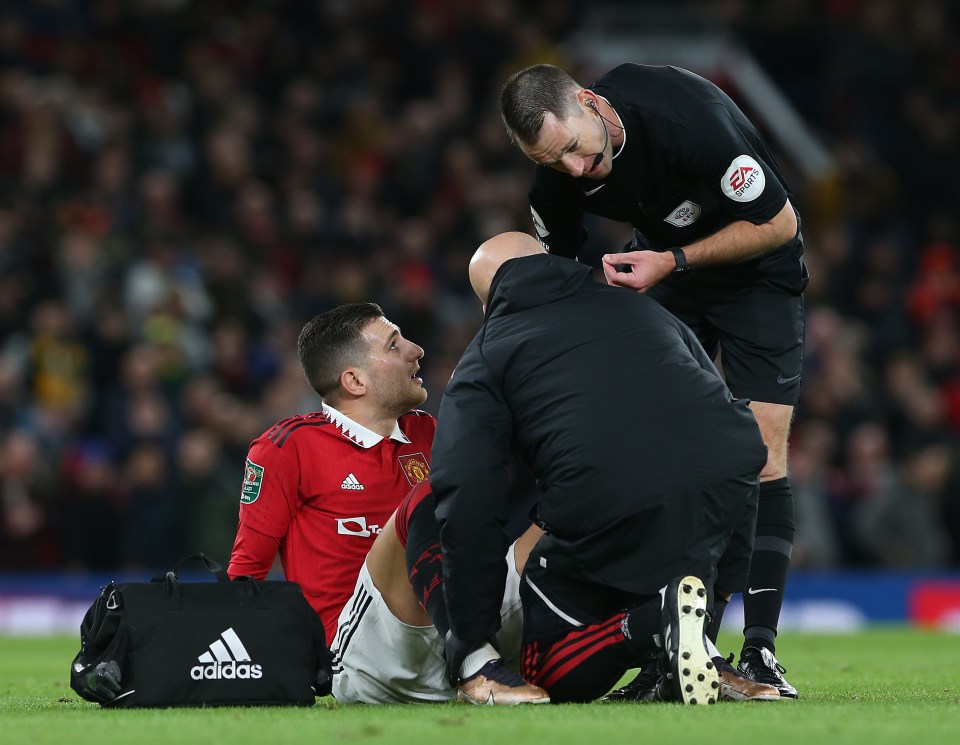 Medical staff assessed Dalot after he went down with a knock