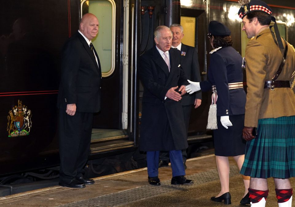 A relaxed King Charles alights in Manchester