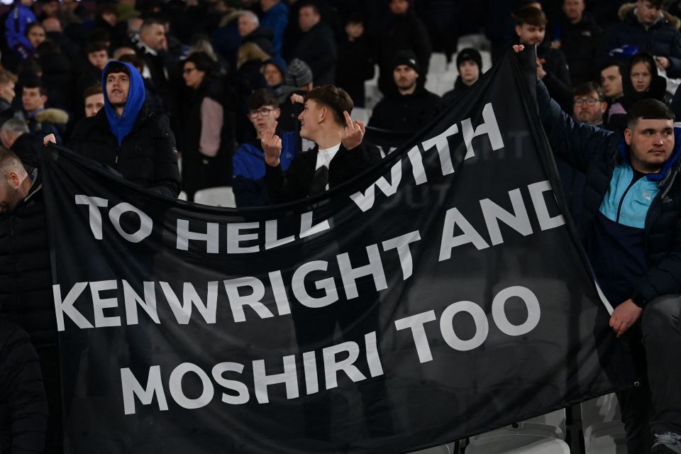 Angry Everton supporters slam the board at the London Stadium