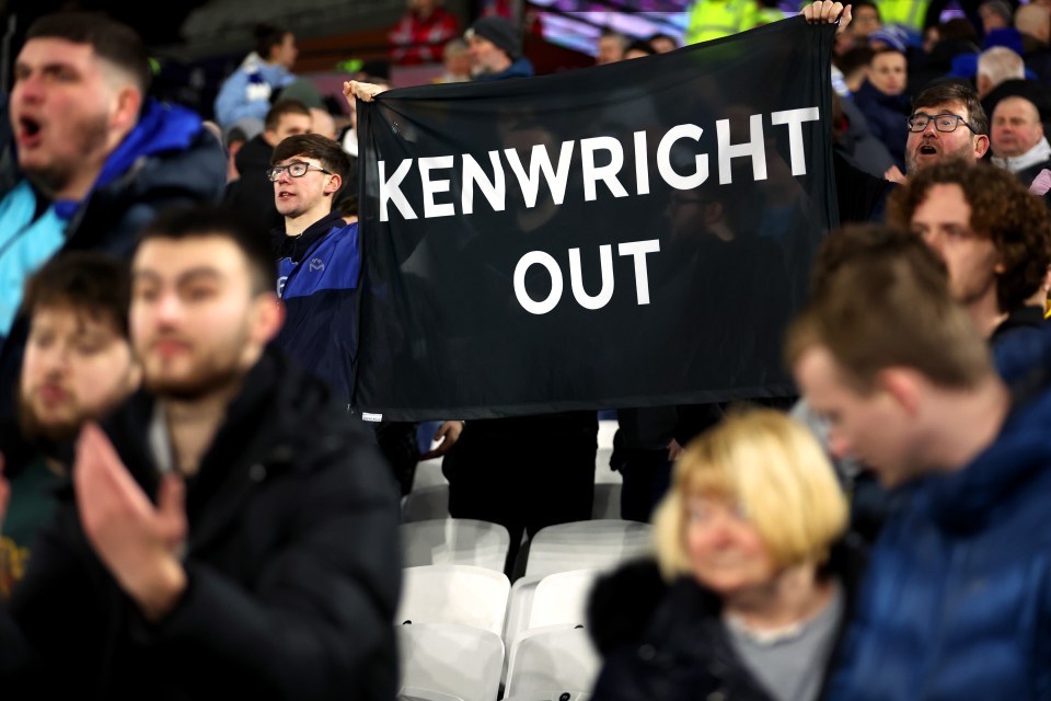 An Everton fan aims a barb at chairman Bill Kenwright