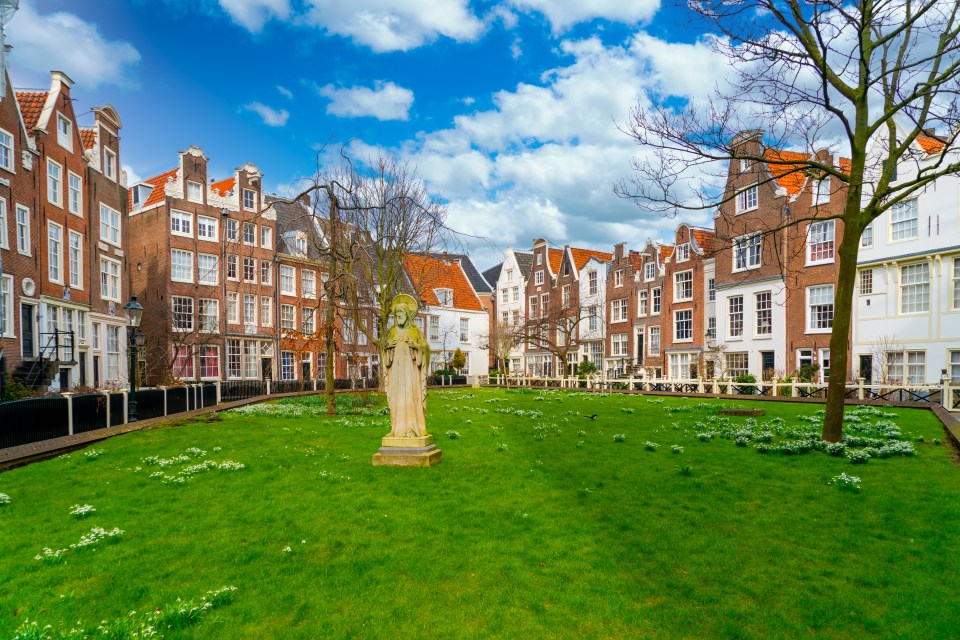 The immaculate Begijn­hof gardens are located off the Spuiplein, with a picture-postcard garden lined with 16th-18th century houses and churches