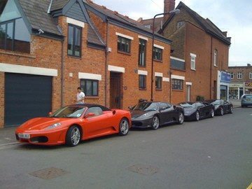 Ferrari's and Lambourgini's parked outside the old bakery in Chingford, home of cocaine gangster Paul Flisher