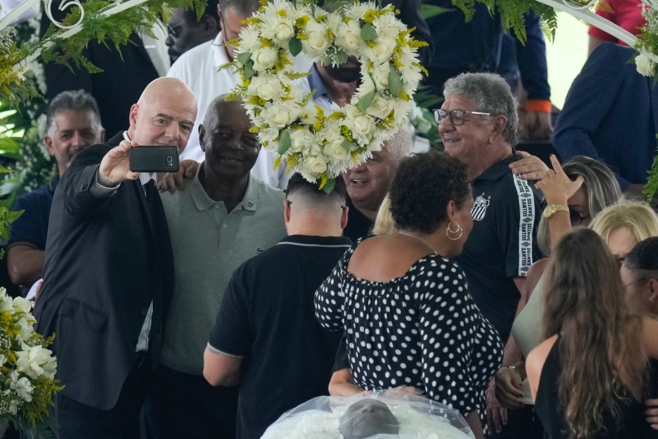 Gianni Infantino takes a selfie with Lima