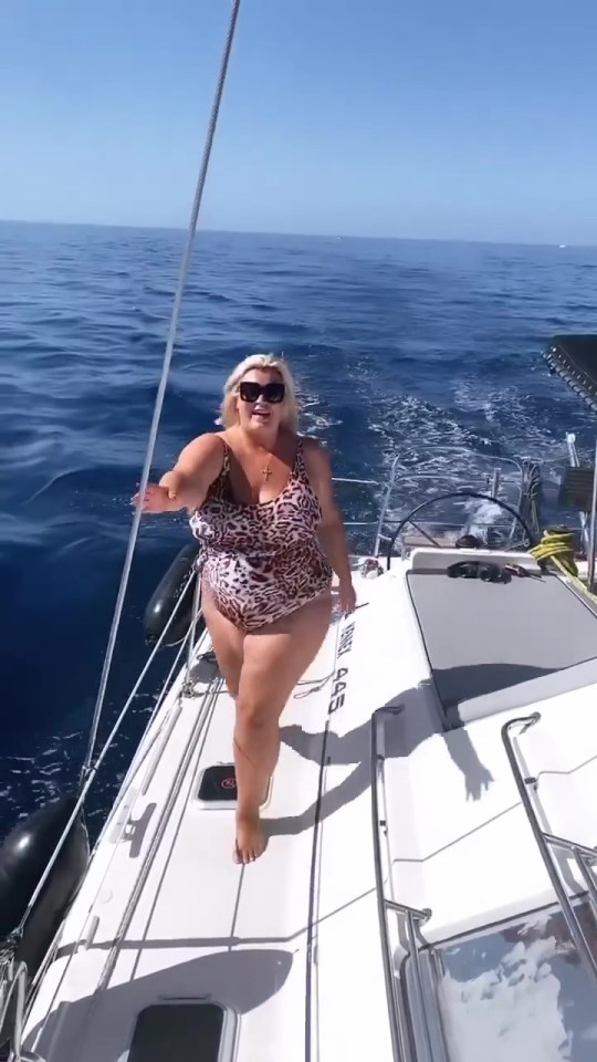 The TOWIE favourite walked around a boat in the leopard-print costume