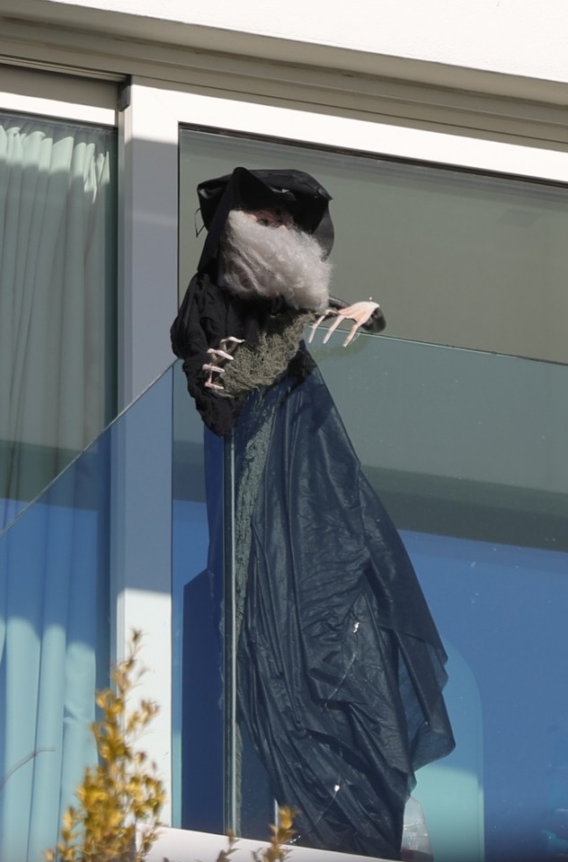 Shakira has put a terrifying life-size witch on her balcony