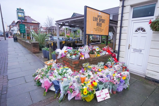 Tributes left for the beautician at the pub in Wallasey