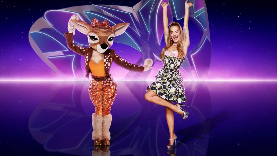 The mysterious Fawn is seen here with judge Rita Ora