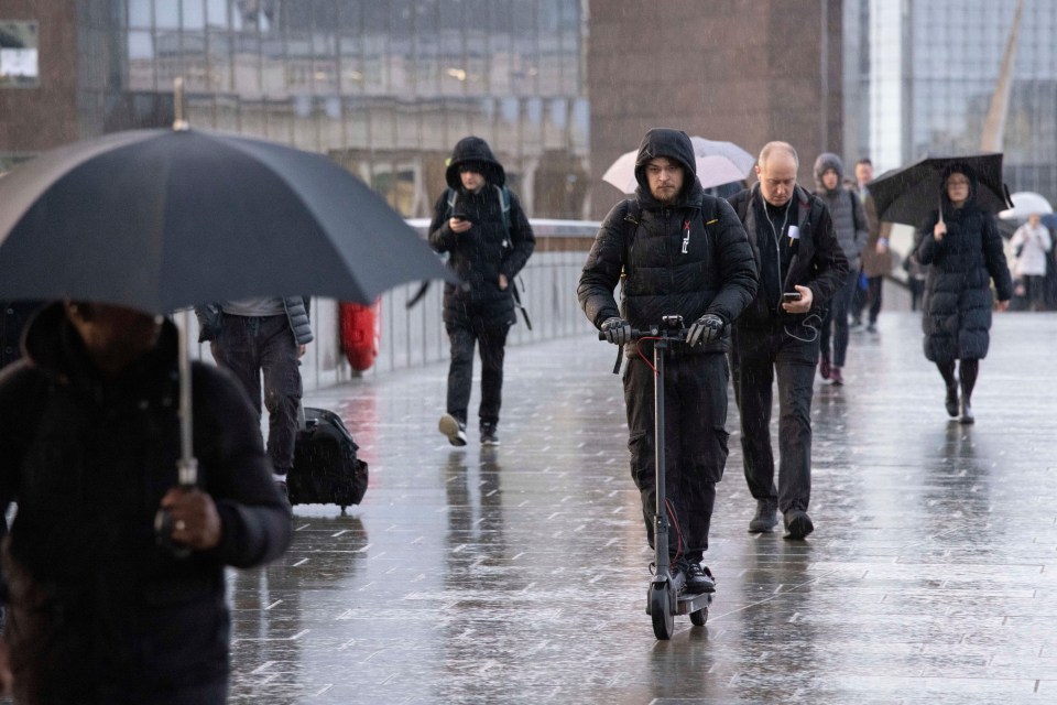 Commuters made their way to the office across London Bridge on their first day back to work in 2023