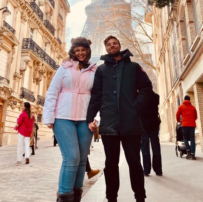 The presenter takes in the sights of Paris with Sam