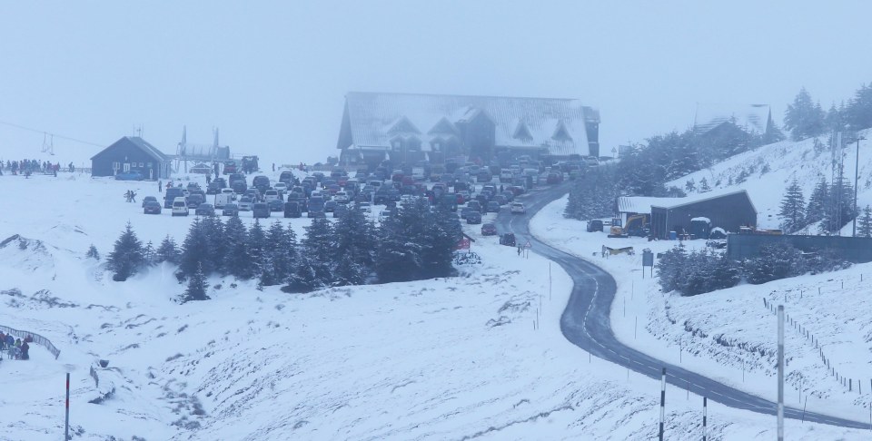 The Lecht ski centre which was busy with skiers today as snow fell on the A939 between Cockbridge and Tomintoul