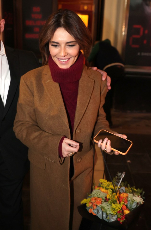 Cheryl was all smiles as she left her West End debut on Sunday night