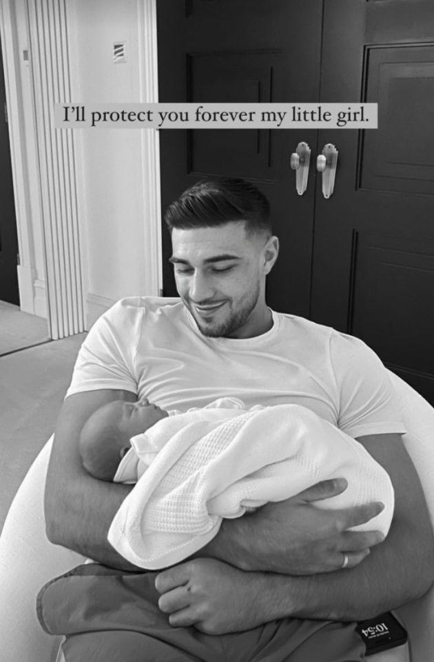 Tommy Fury can't take his eyes off his newborn daughter