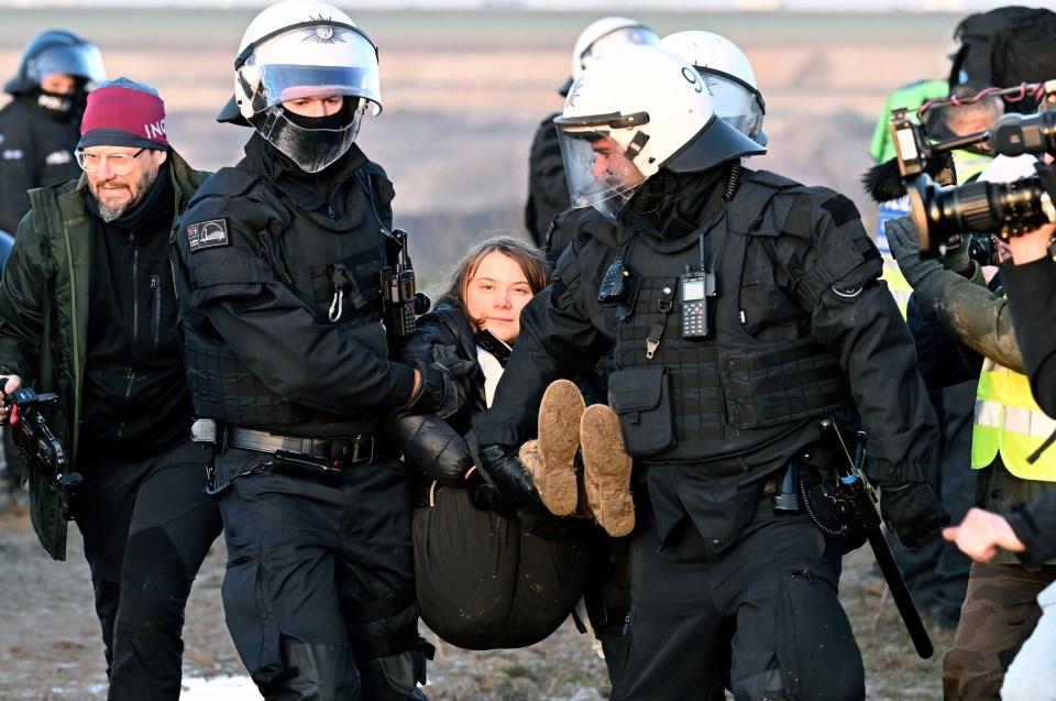 Greta Thunberg is hauled off by cops during the anti-coal mine protest in Germany