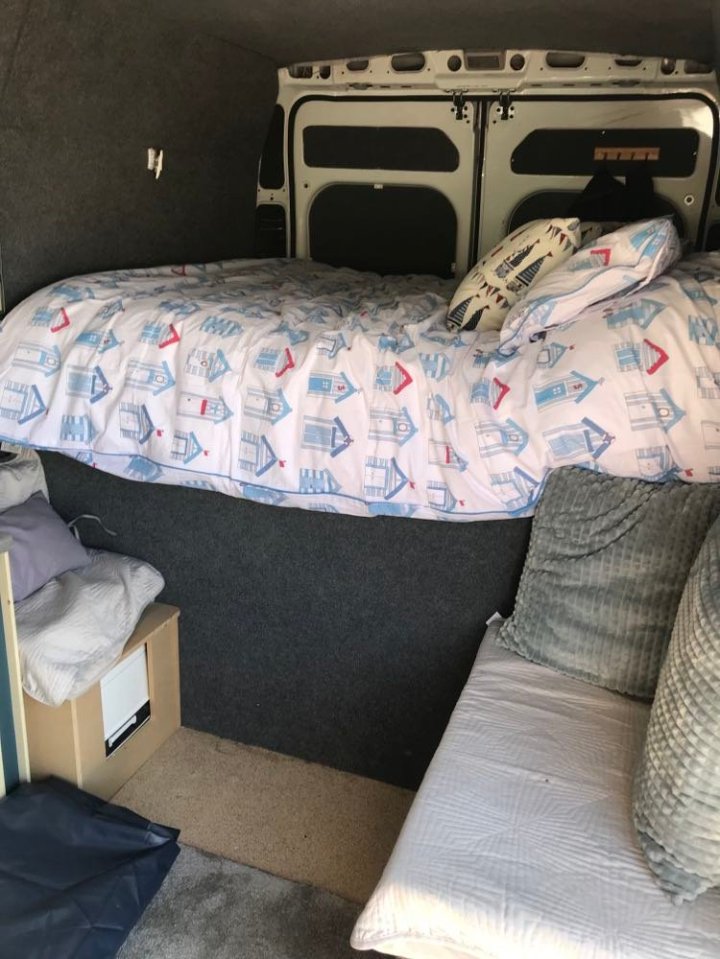 The van has a double mattress with storage underneath