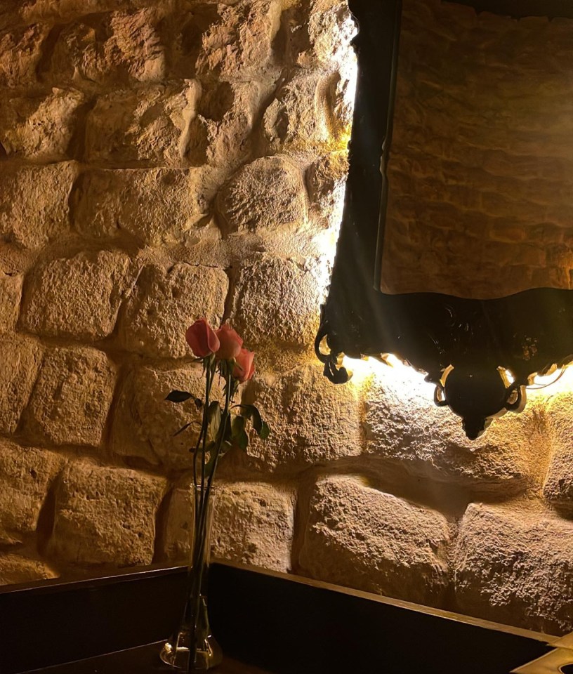 There were roses at the table for the loved-up couple