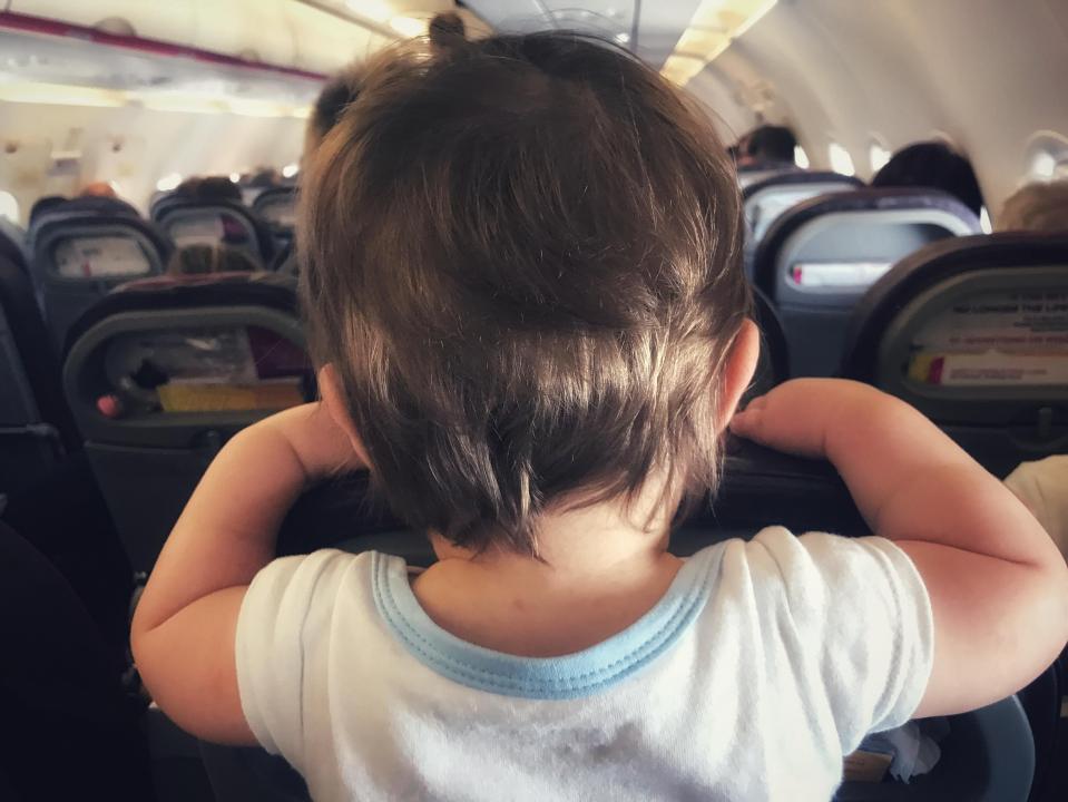 Avoid bulkhead seats - but book an exit row - to avoid babies and young kids