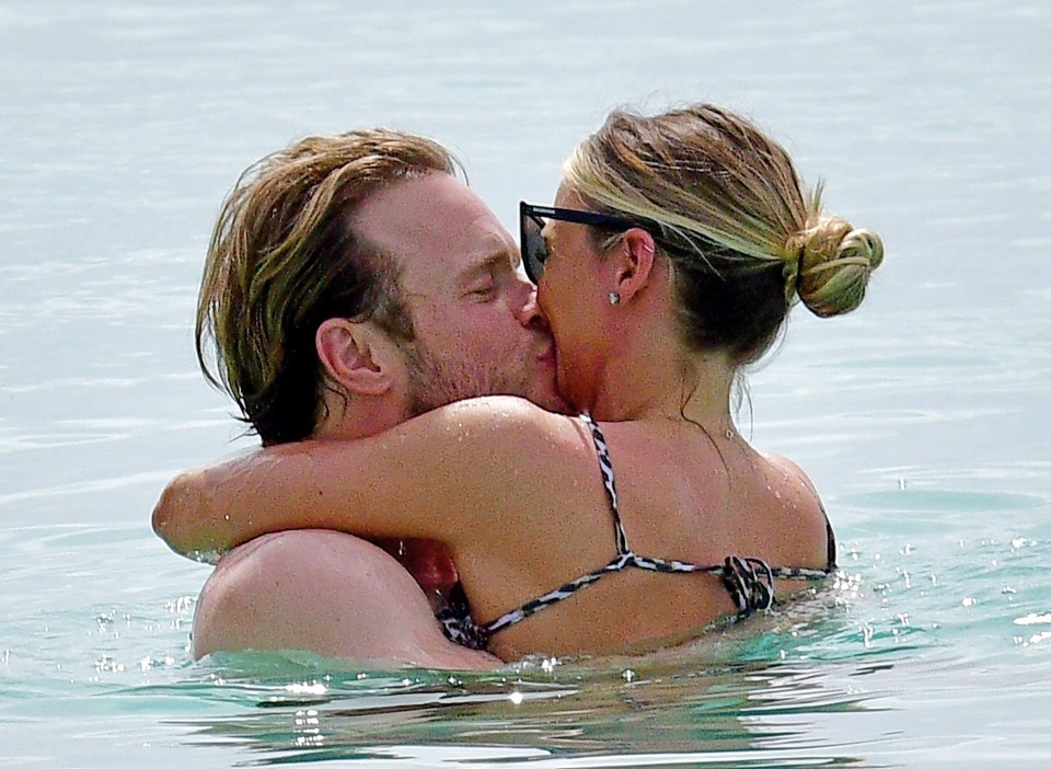 The couple were also seen kissing and cuddling in the sea during their getaway to Barbados