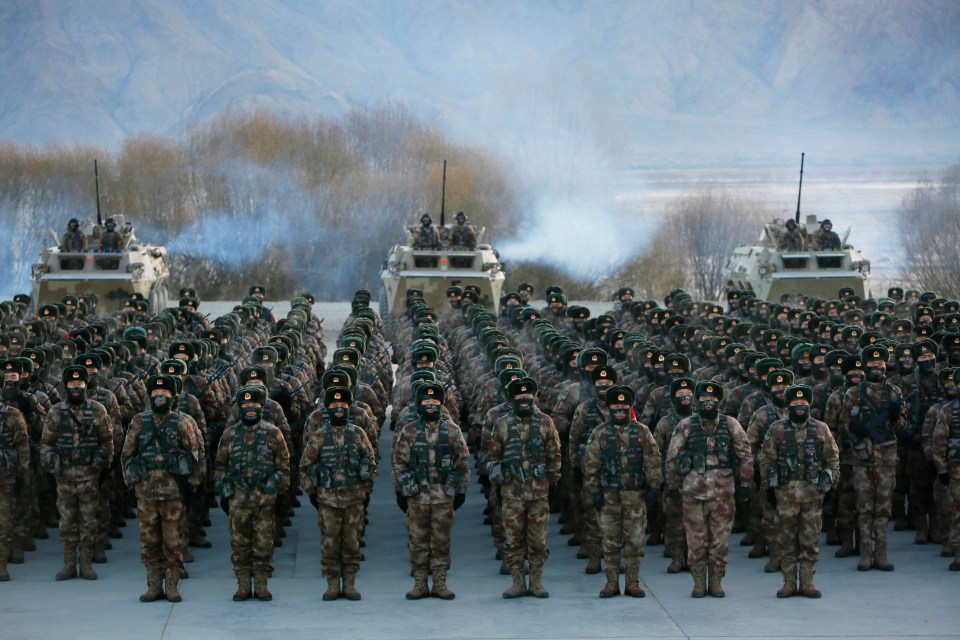 Chinese soldiers assembling during military training in the Xinjiang region