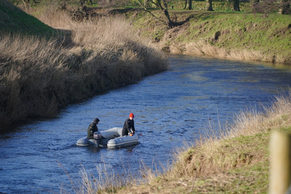 Specialist search officers scouring the water