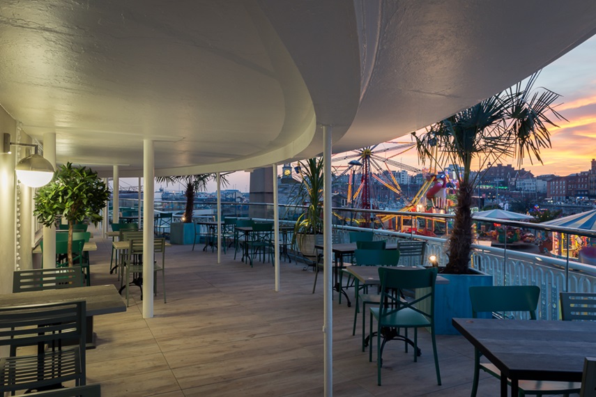 The pub maintains some of the pavilion's original features, including the classic circular windows