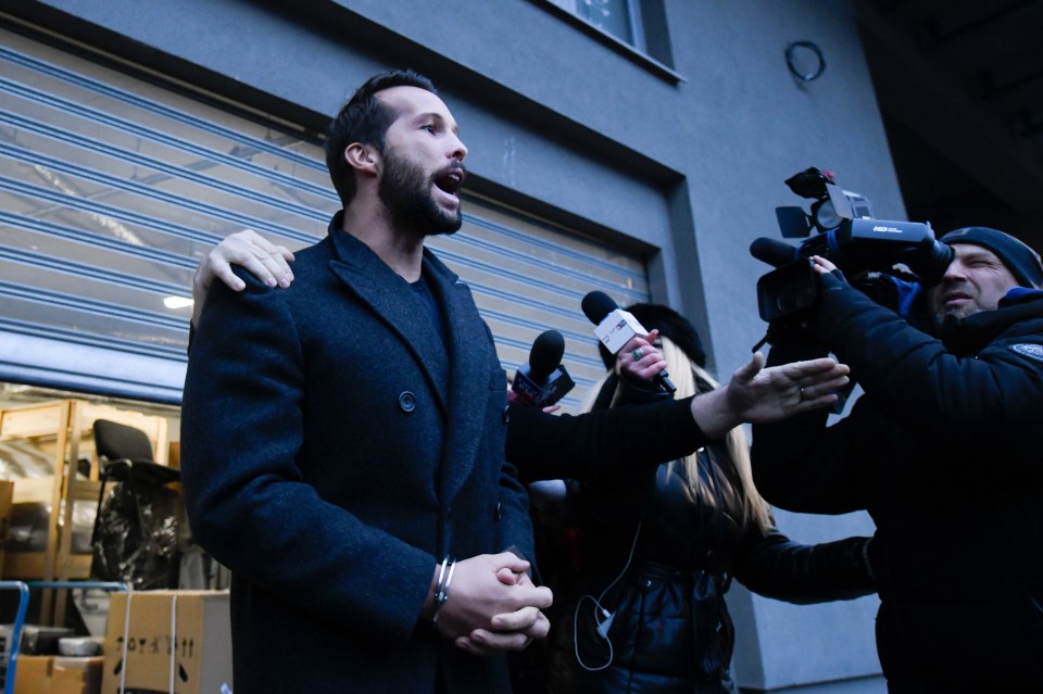 Tristan speaks to reporters outside Romania's organised crime and terrorism unit