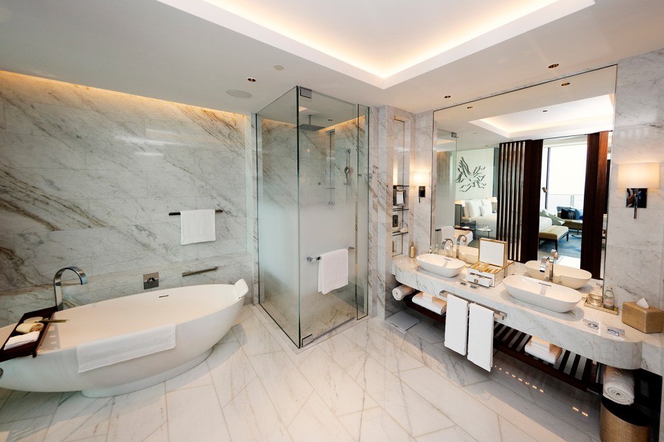 One of the hotel's luxury bathrooms featuring his and hers sinks