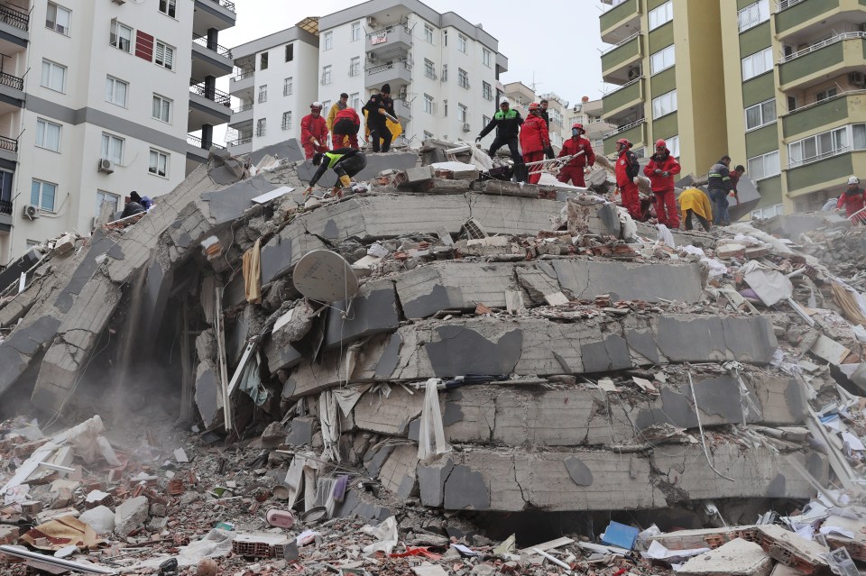 Firefighters conduct search and rescue operations after two huge quakes hit Turkey