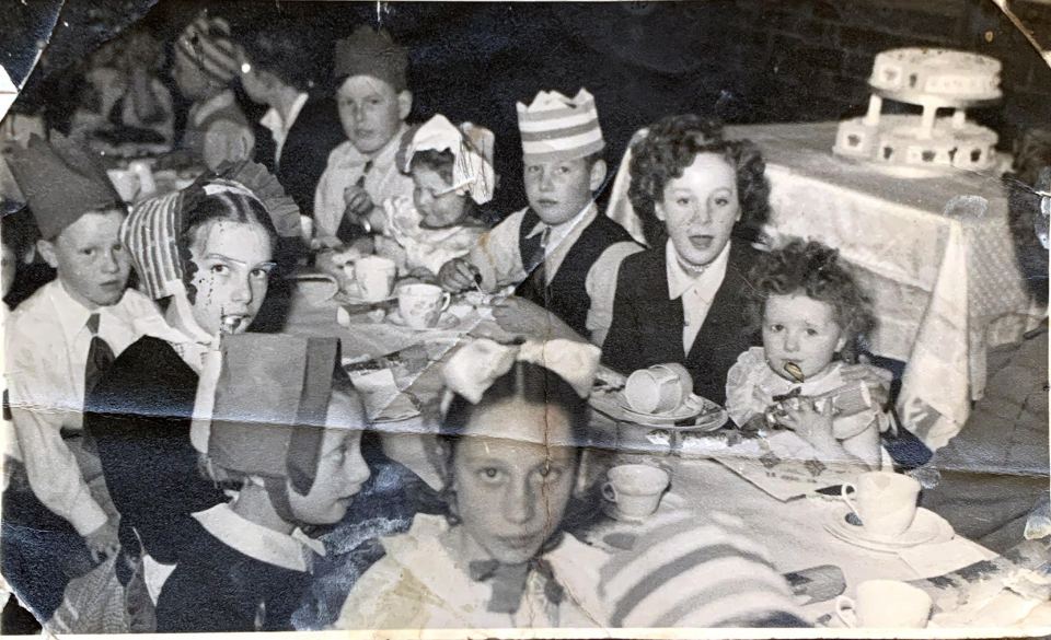 Our picture shows Arthur with his brother David, ten, and sister Pam, three, at a Coronation party in London’s East End