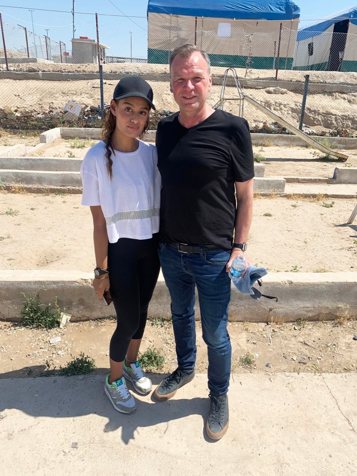 Begum with filmmaker Andrew Drury at the Al-Roy prison camp in northeast Syria