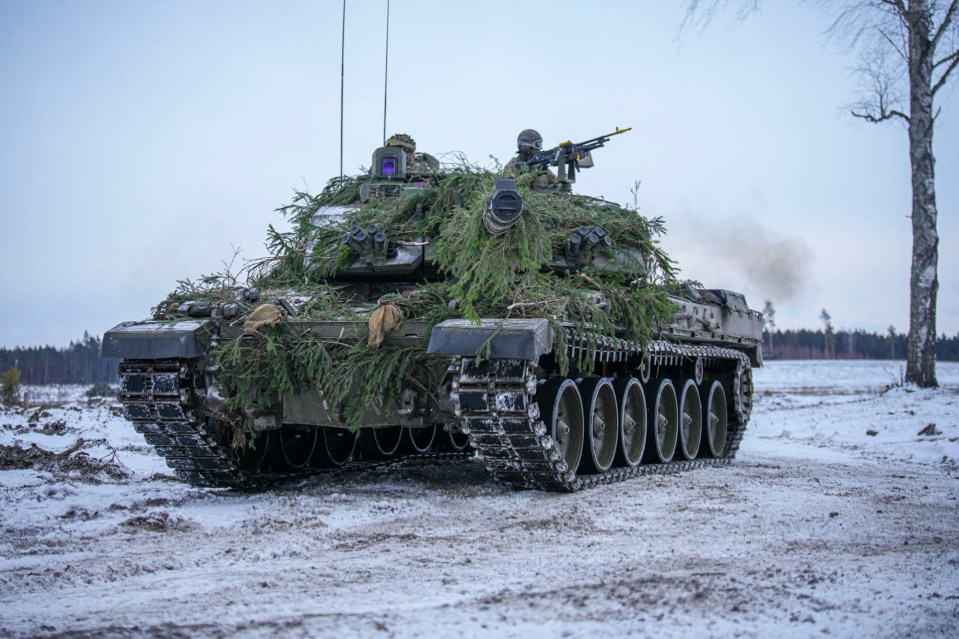 A British tank rumbles through the snow in Eastern Estonian