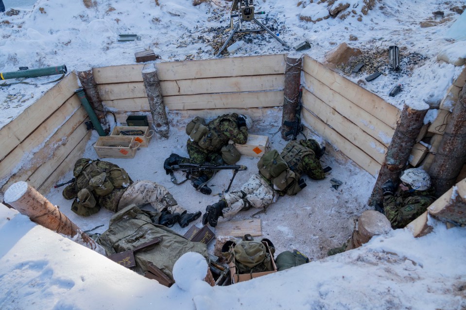 Pictures show soldiers 'taking cover from Russian troops' in a bunker at the base