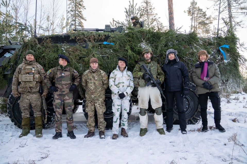 Nato forces are carrying out joint drills in Eastern Estonia - pictured are the commanders including Colonel Merilo (3rd from right)