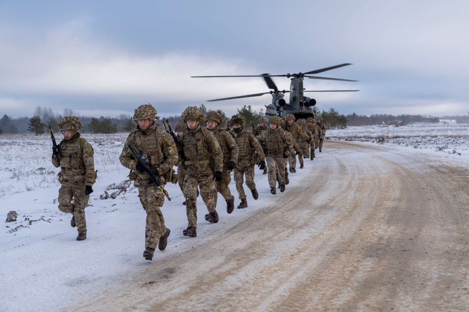 King’s Royal Hussars armoured regiment disembark a Chinook