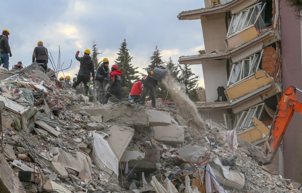 Rescue teams picking through the rubble for survivors