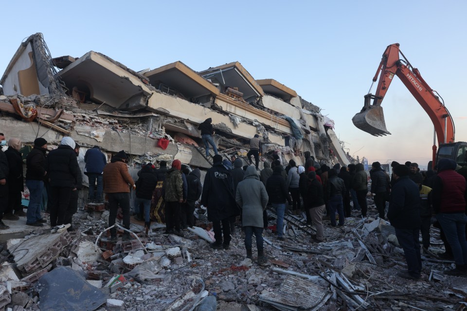 Frantic rescue efforts continue as voices shout from the rubble