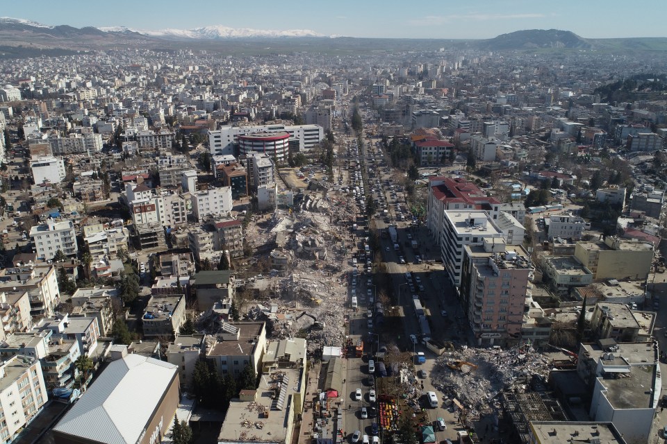 An aerial view of collapsed buildings in Adiyaman