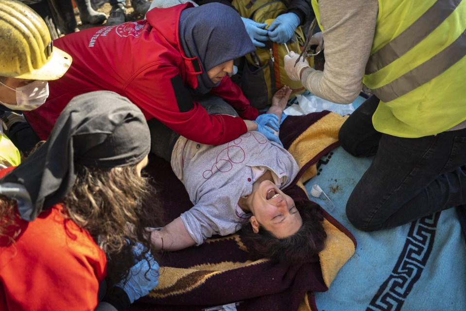 The survivors were found in the remains of a flattened block in Hatay, Turkey