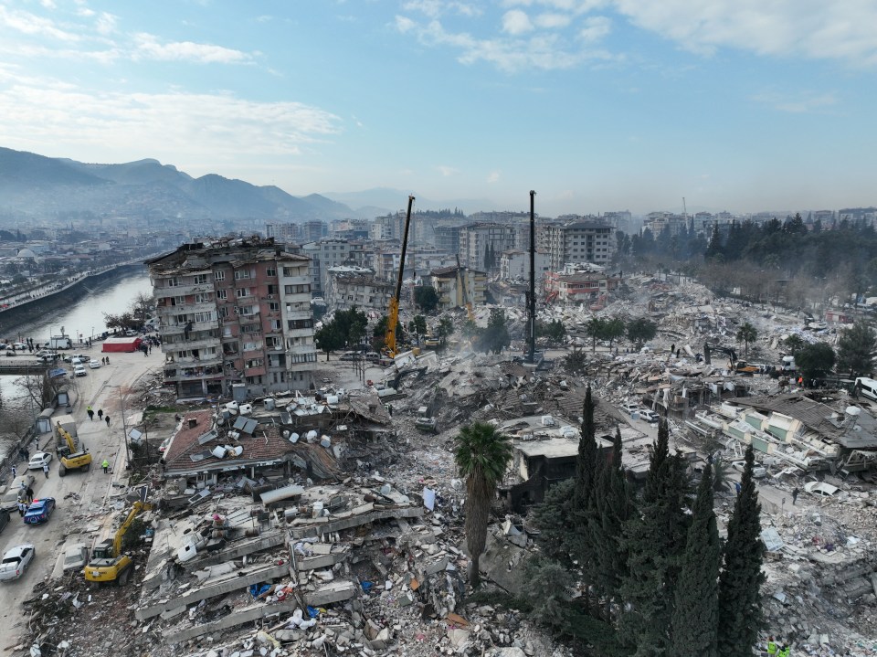 Search for bodies in flattened housing blocks in Hatay, Turkey