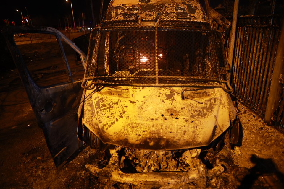 The van was torched after a protest became 'out of control'