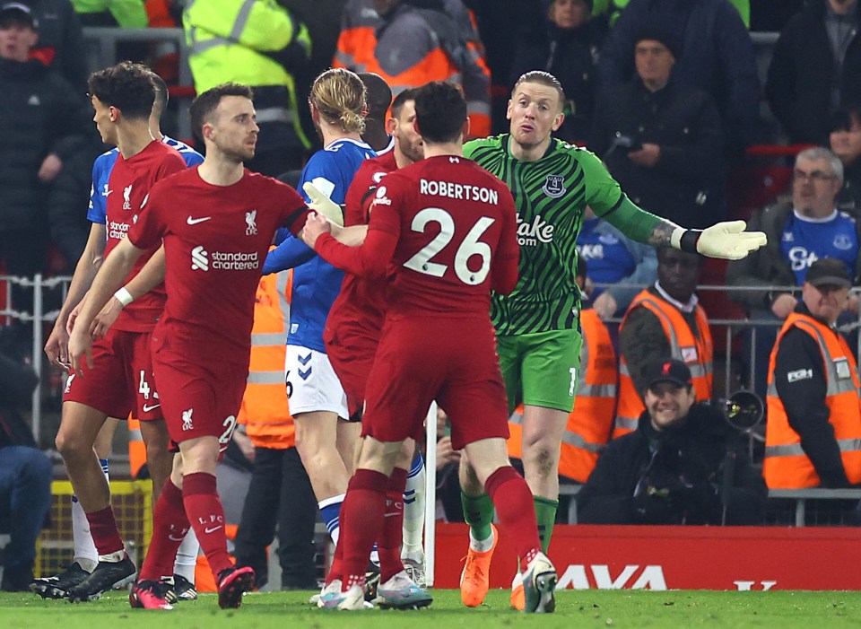 Andy Robertson and Jordan Pickford continue to clash