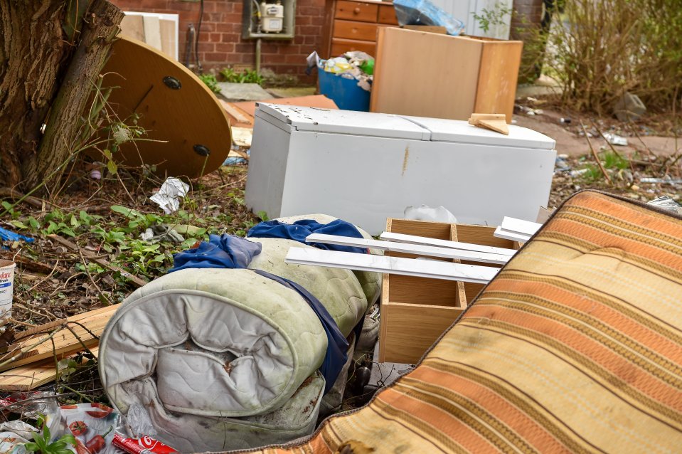 Filthy mattresses, broken fridges, an old toilet and smashed bed frames