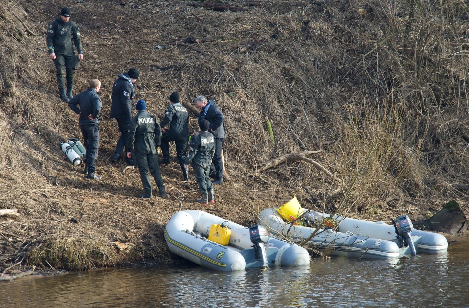 Police rescue teams searching the area for the missing mum