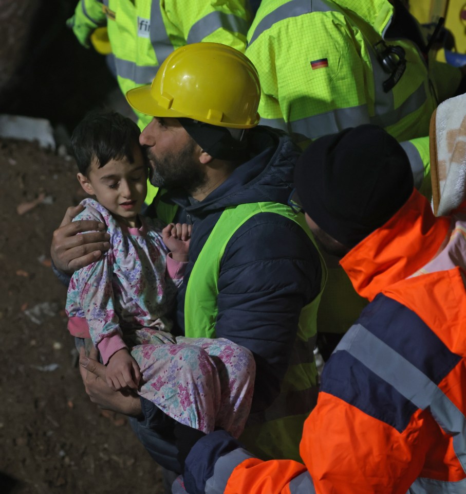 Serap Topal and her five-year-old son, Mehmet Hamza Topal are rescued by the German and British rescue teams from under the rubble after 68 hours