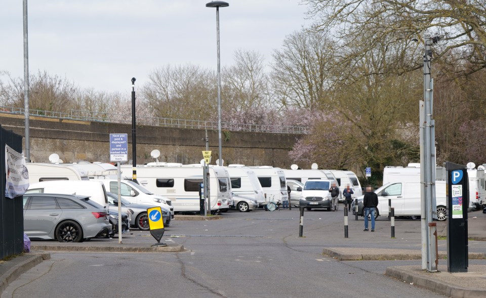 A large group of travellers have descended onto the tourist car park by Windsor castle