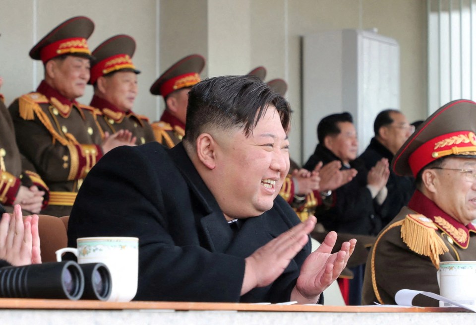 A delighted Kim Jong-un at the military parade earlier in February