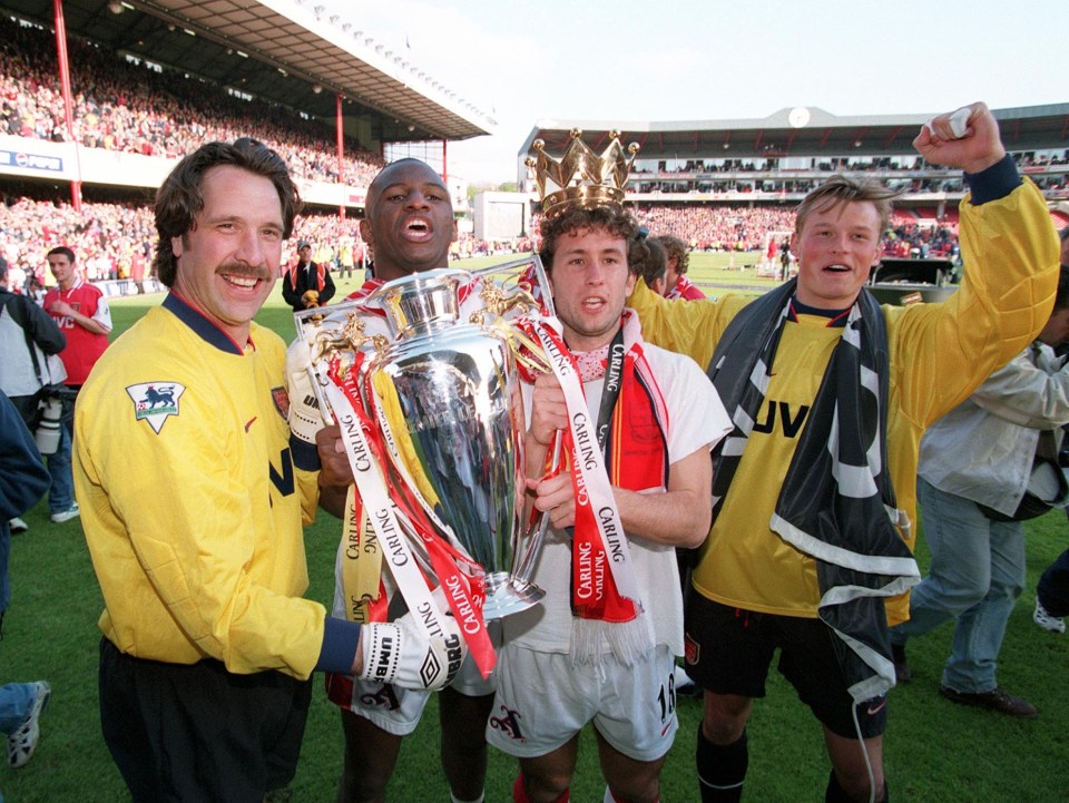 David Seaman, Patrick Vieira and Gilles Grimandi carry the 1998 Premier League trophy