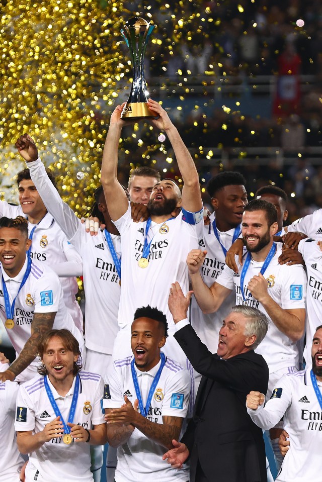 Karim Benzema of Real Madrid lifts the Club World Cup trophy