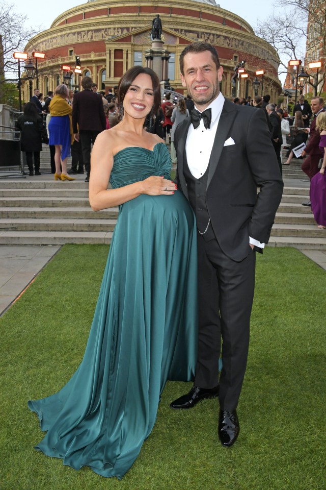 Pregnant Liz and Kelvin at awards bash last year