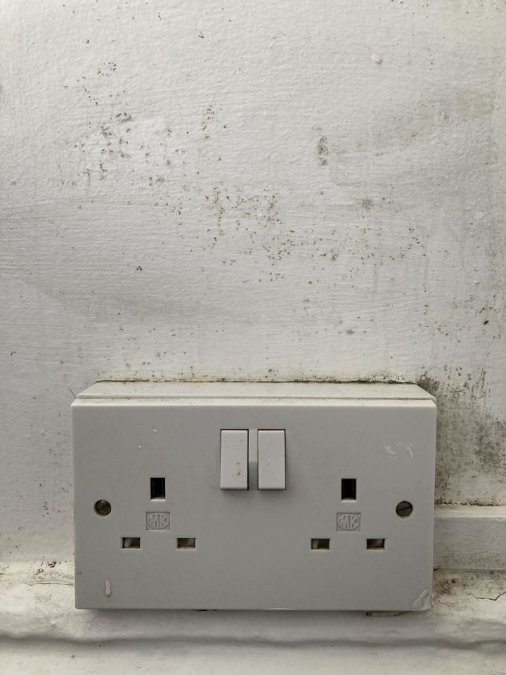 BEFORE: There was lots of ingrained mould around my plug socket