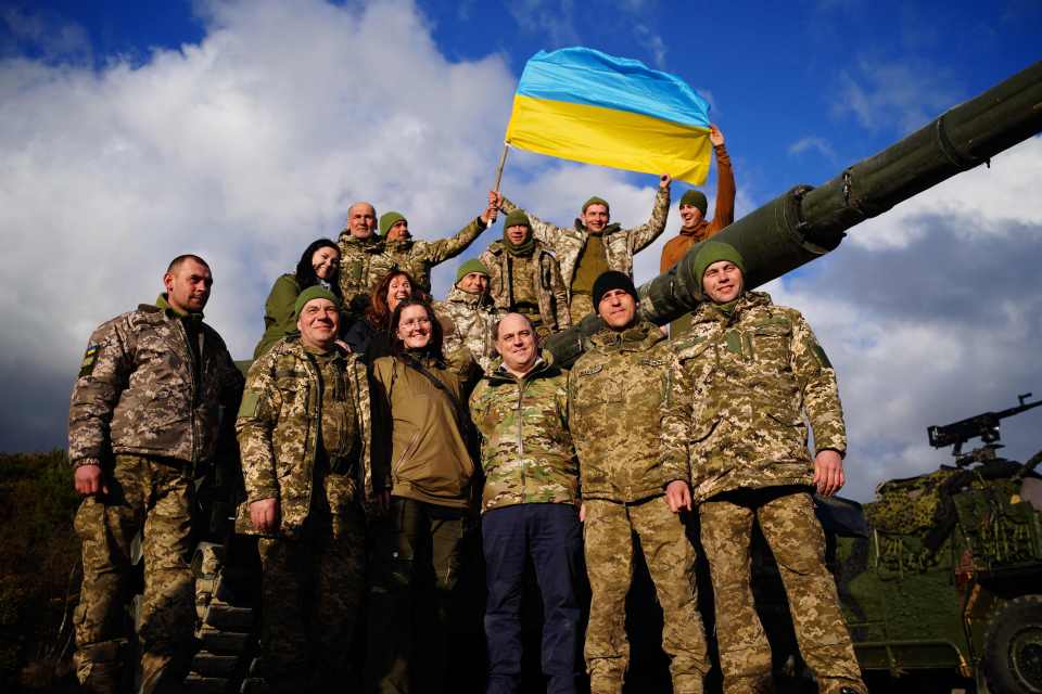 Ben Wallace with Ukrainian soldiers training at a camp in Britain